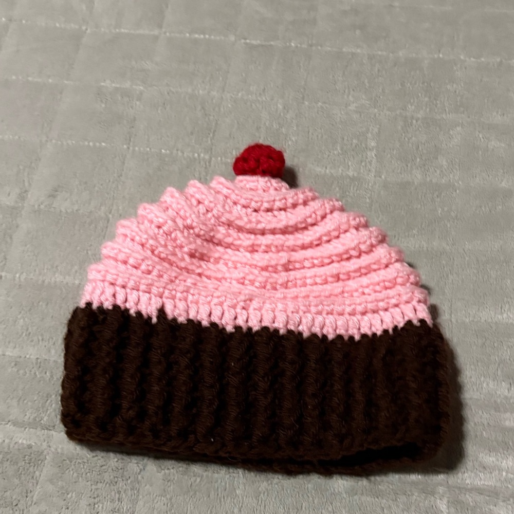 Handmade Knit Hat Cupcake
Could fit a small child.
